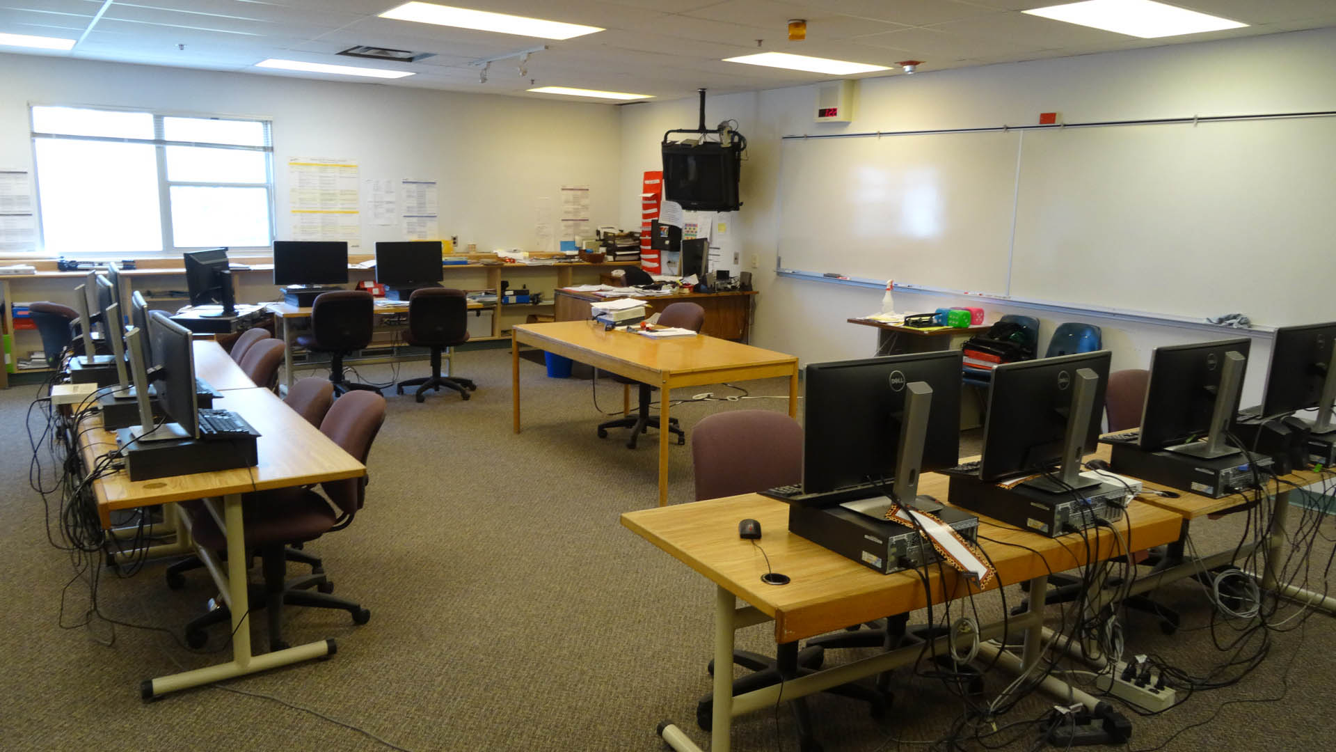 classroom with computers on desks